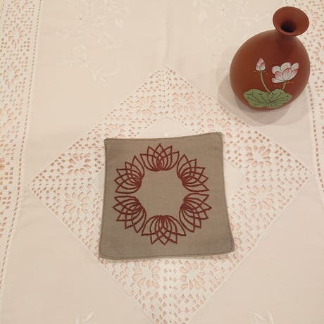 Set of 2 Vietnamese hand-embroidered coasters in a lotus pattern, grey and brown
